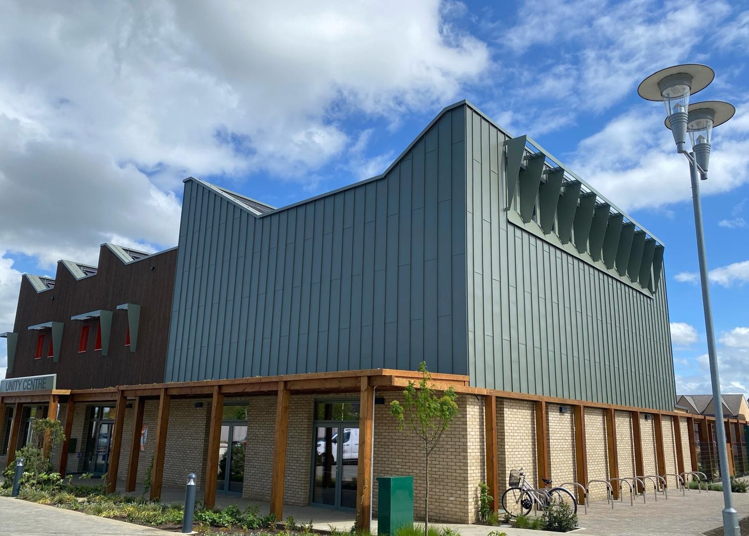 Zinc Standing Seam and Wood Cladding for Cambridge Project